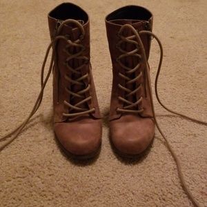 High heeled combat boots